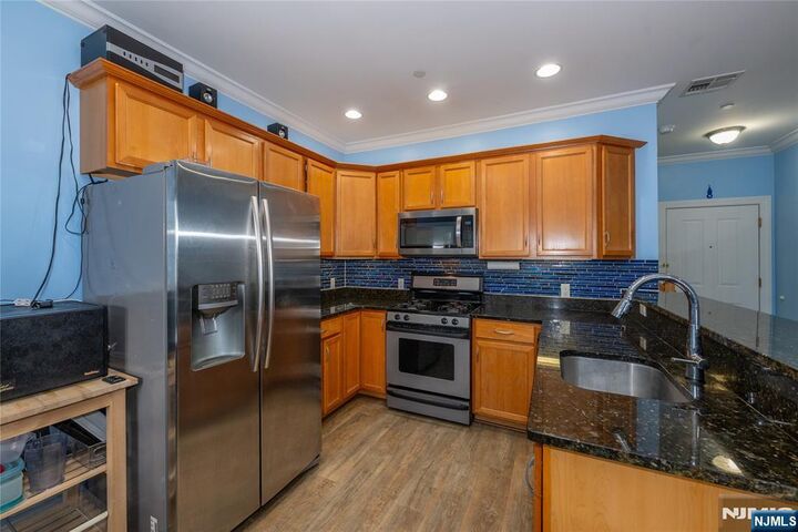 Property Photo:  604 Avenue A 104  NJ 07002 