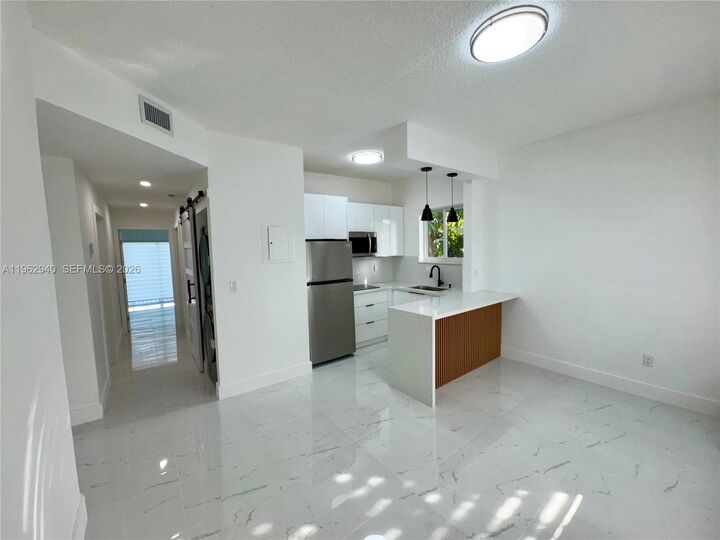 Property Photo: 421 NW 13th Ave B FL 33125