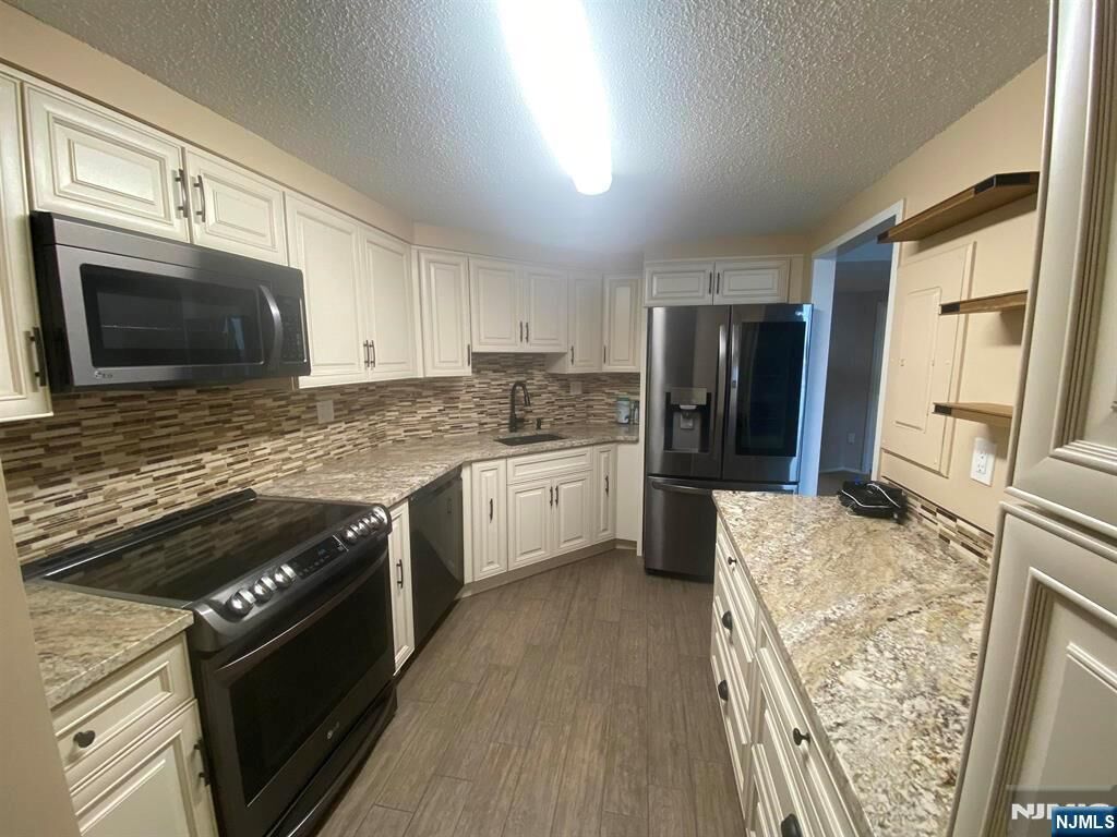 Property Photo:  1836 Harmon Cove Tower 1836  NJ 07094 