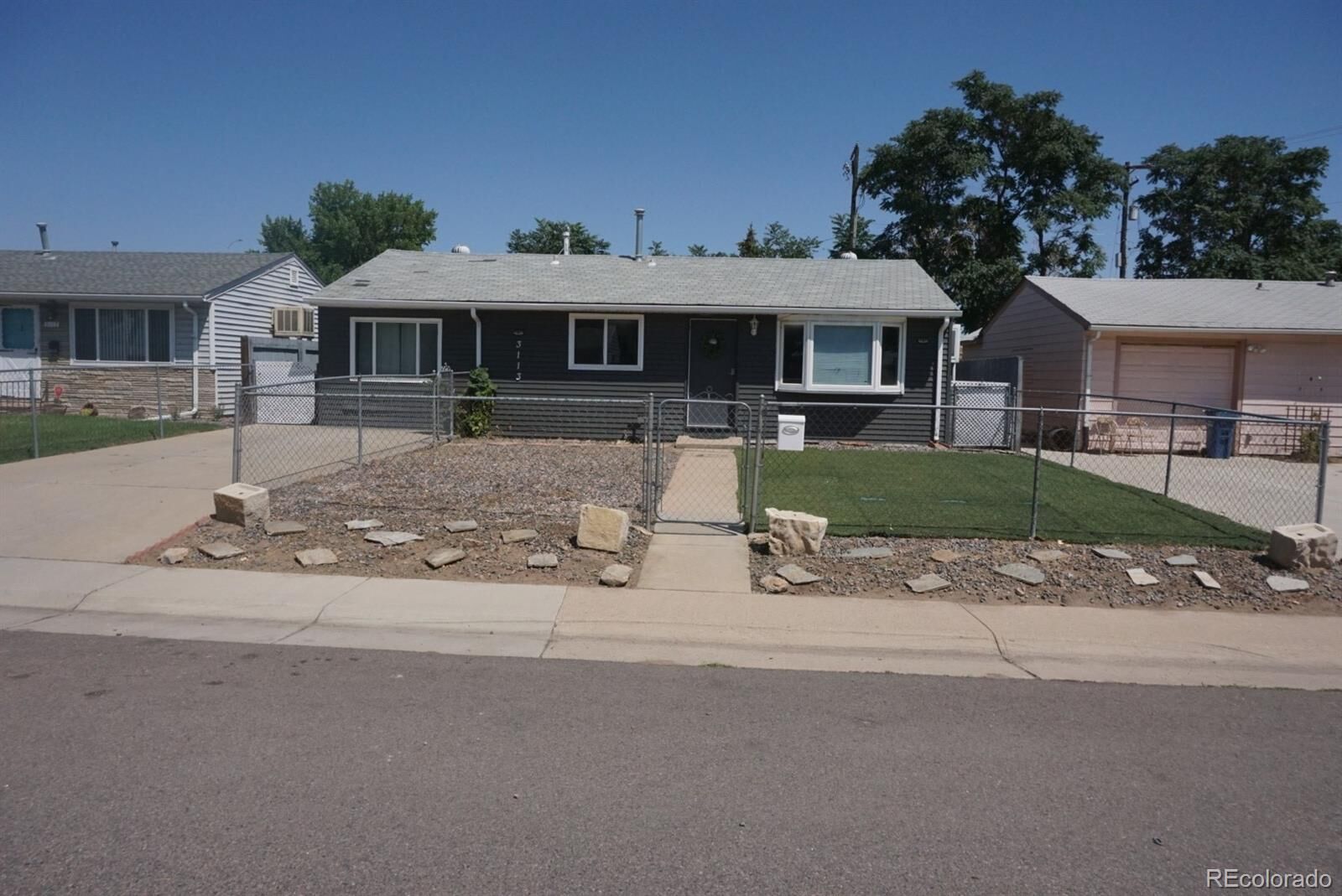 Property Photo:  3113 W Jefferson Avenue  CO 80110 