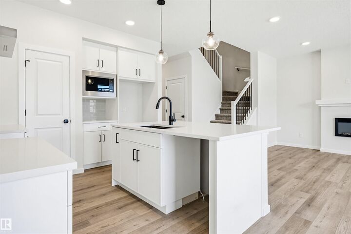 Property Photo:  17351 3 Street NW  AB T5Y 4G7 