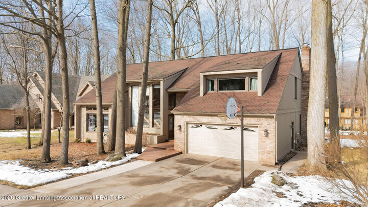 Property Photo:  1986 Thistlewood Road  MI 48864 
