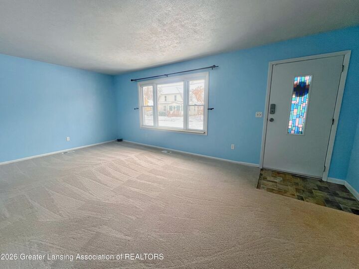 Property Photo:  615 Broadway Avenue  MI 48867 