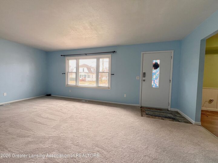 Property Photo:  615 Broadway Avenue  MI 48867 