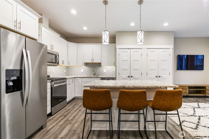 Property Photo:  5683  Sunstone Place 102  WA 98248 