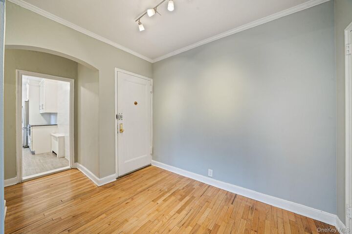 Property Photo:  1 Town House Place 3H  NY 11021 