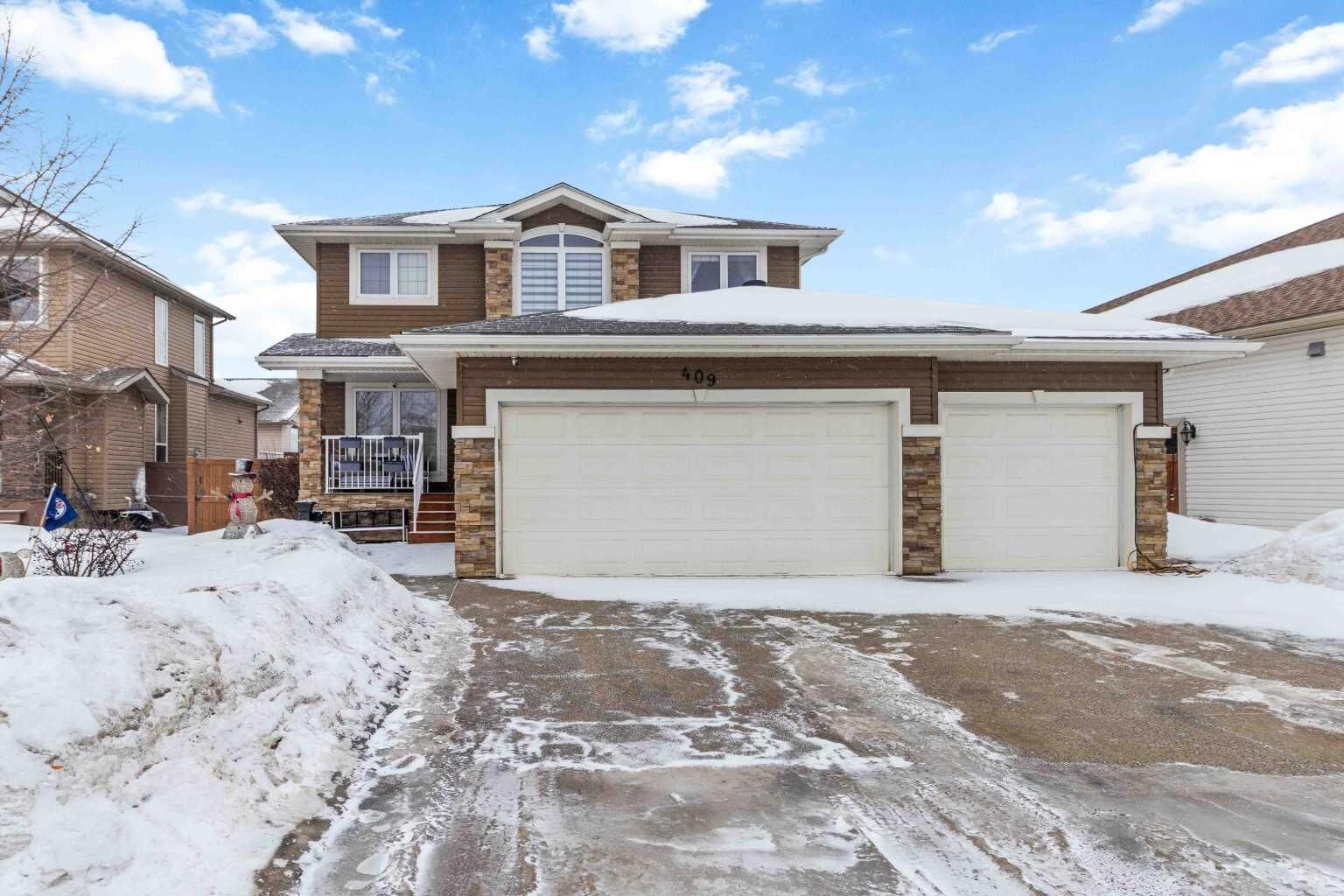 Property Photo:  409 Loutit Road  AB T9K 0S3 