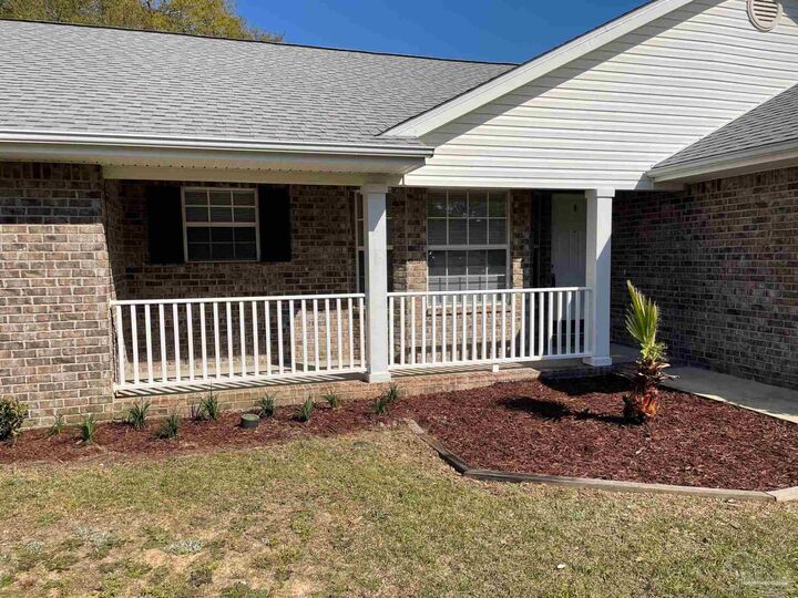 Property Photo:  4873 La Casa Cir  FL 32571 