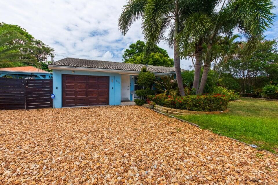 Property Photo:  145 SE 3rd Avenue  FL 33435 