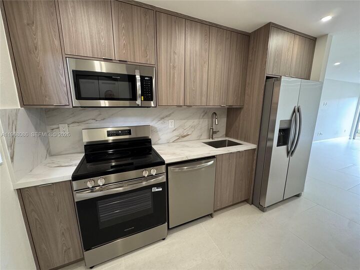 Property Photo:  1900 W 54th St 219  FL 33012 