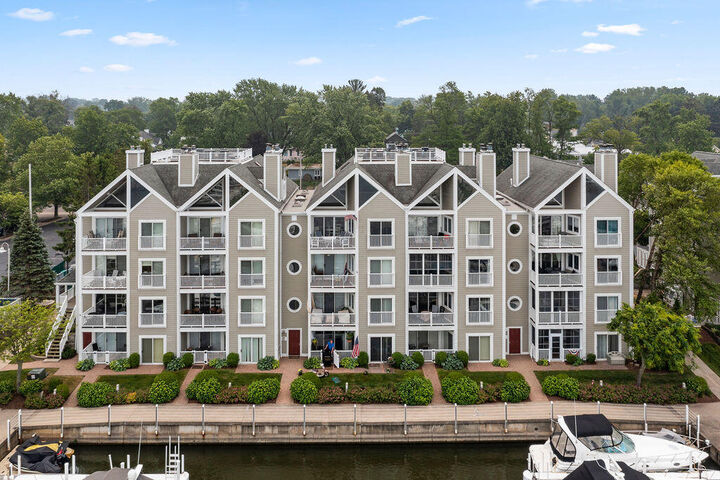 Property Photo:  310 Oselka Drive  MI 49117 