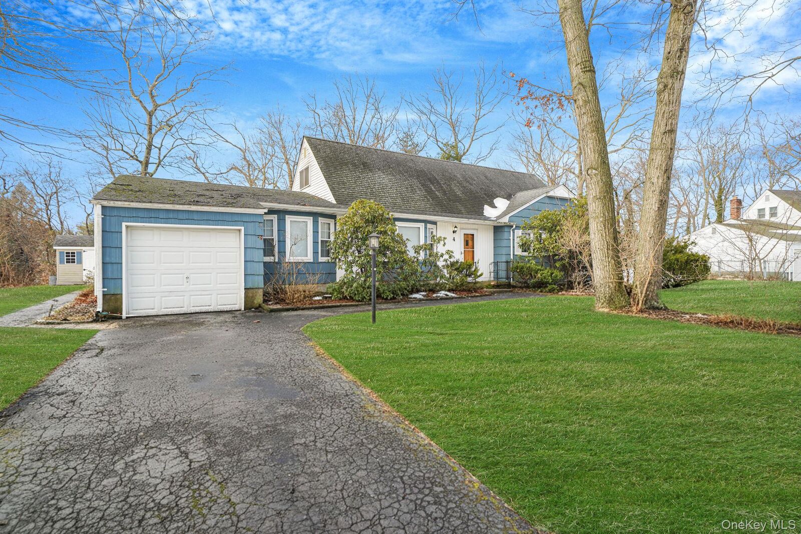 Property Photo:  4 Orchid Drive  NY 11776 