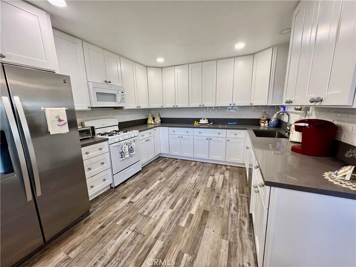 Property Photo:  7150 Redwood Avenue  CA 92345 