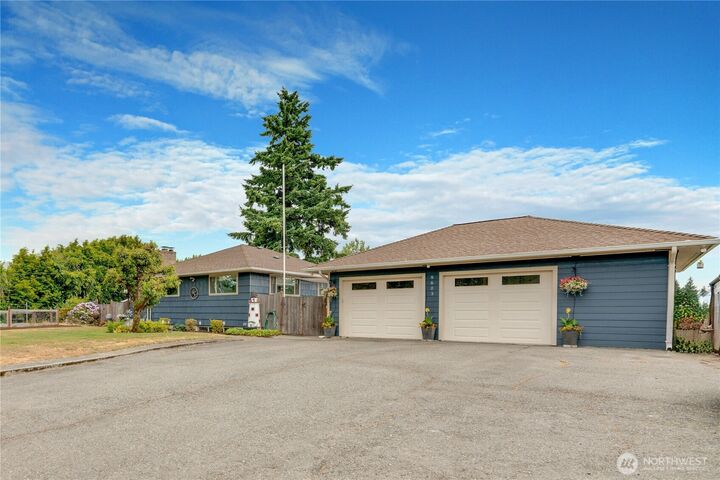 Property Photo: 8603 Woodland Avenue E WA 98371