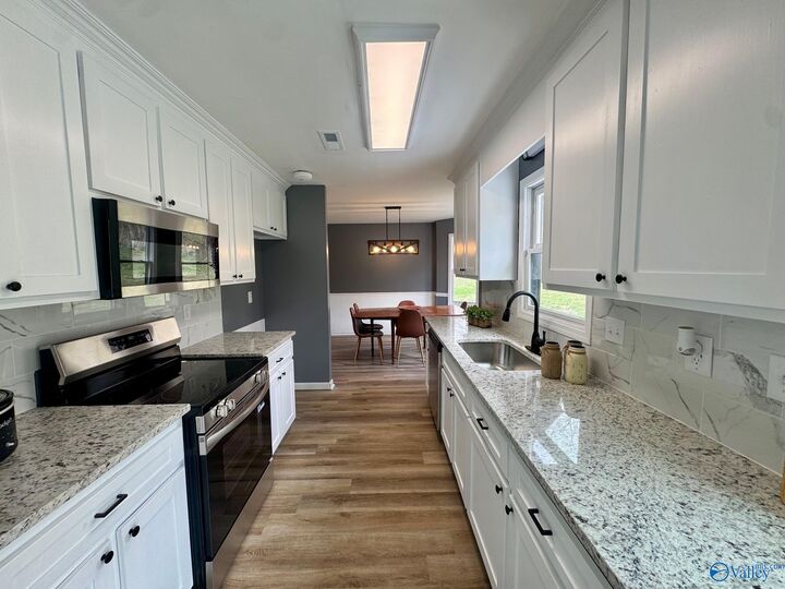 Property Photo:  8047 Wall Triana Hwy  AL 35749 