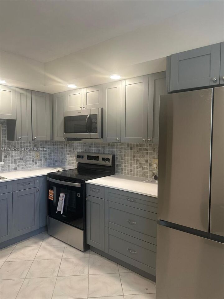 Property Photo:  12800 SW 7th Ct 306G  FL 33027 