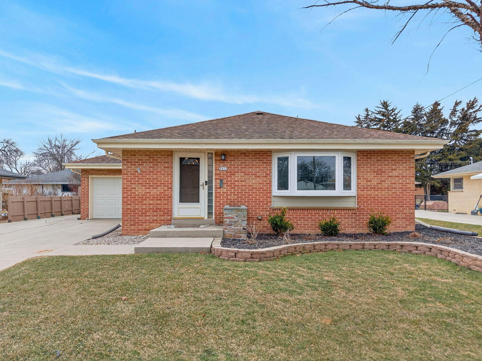 Property Photo:  7413 W Ohio Ave  WI 53219 