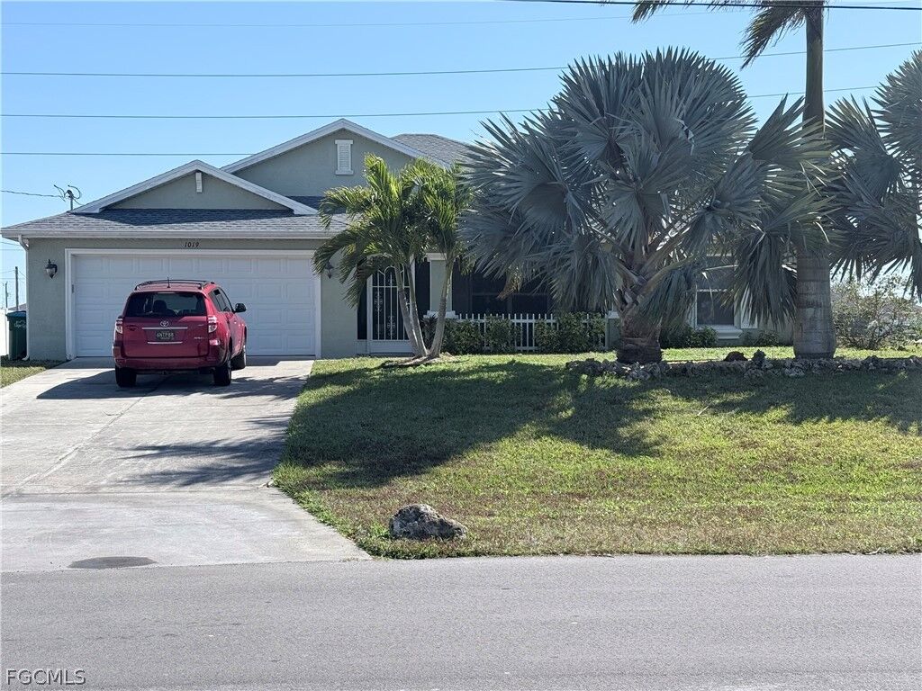 Property Photo:  1019 NW 24th Place  FL 33993 