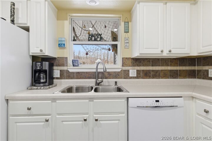 Property Photo:  40 Lighthouse Road 102  MO 65049 