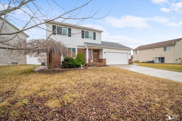 Property Photo:  9061 Rockhill Lane  MI 48166 