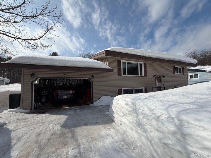 Property Photo:  108 Woodland Drive  MI 49866-1510 