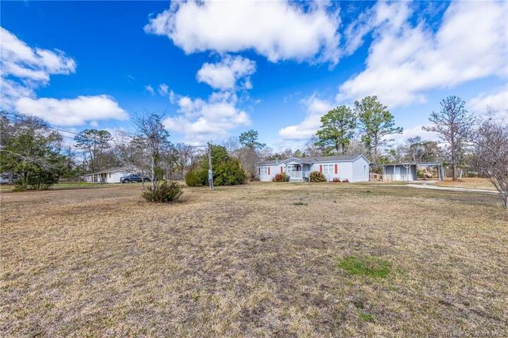 Property Photo:  831 W Houston River Road W  LA 70663 