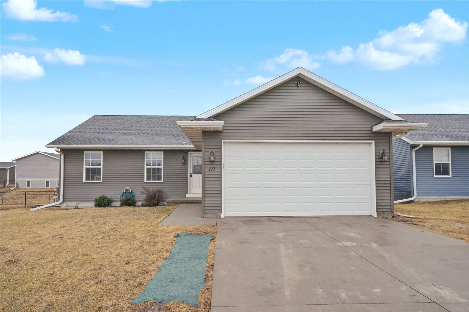 Property Photo:  111 Blue Jay Avenue  IA 52349 