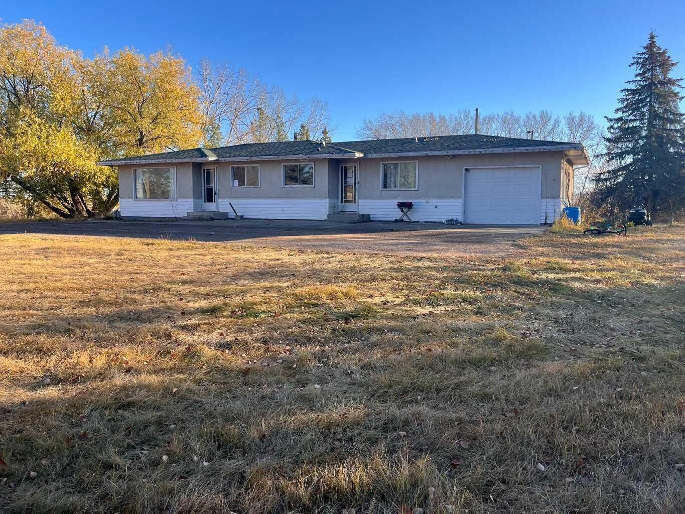 Property Photo:  58032 Range Road 101  AB T0A 3A0 