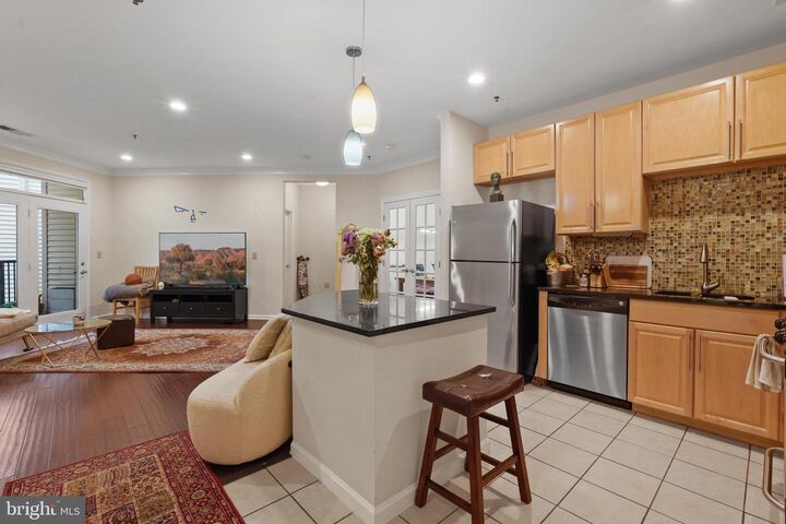 Property Photo:  1201 East West 222  MD 20910 