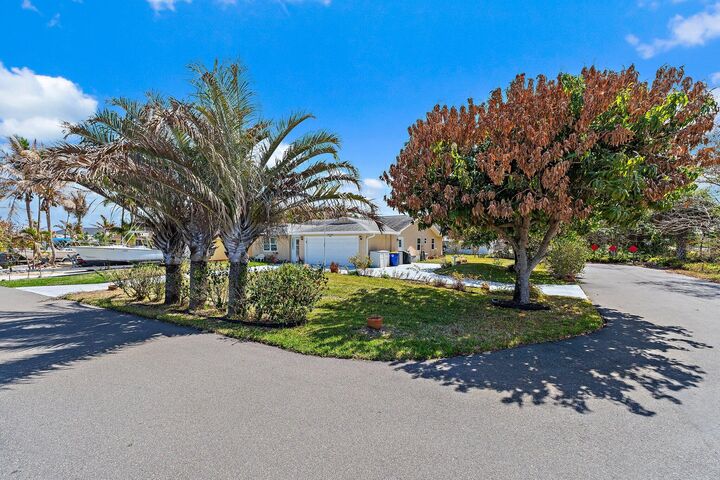 Property Photo:  7954 SE Carlton Street E  FL 33455 