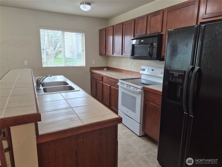 Property Photo:  1725 E 41st  WA 98404 