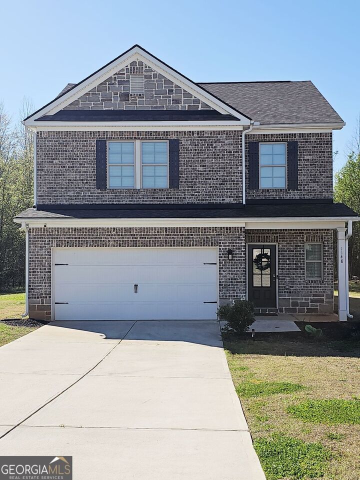 Property Photo:  1148 Burgundy Drive  GA 30223 
