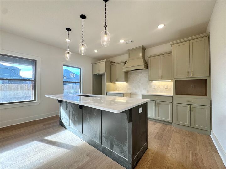 Property Photo:  4800 SW Scarlet Oak Street  AR 72713 