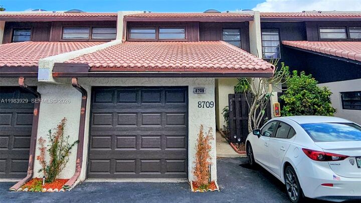 Property Photo:  8709 NW 35th St 5  FL 33065 