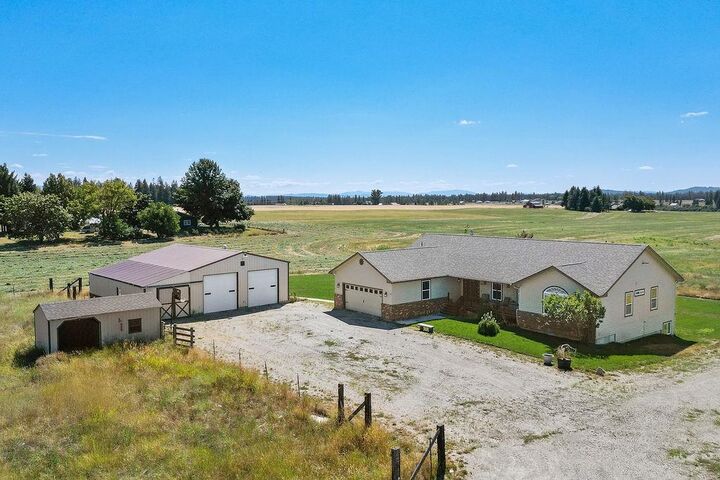 Property Photo:  8715 W Antler Rd  WA 99006 