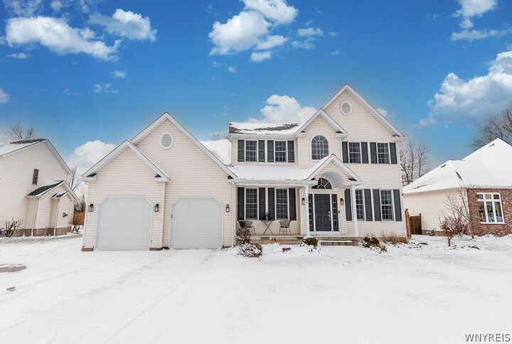 Property Photo:  202 Woodstream Drive  NY 14072 