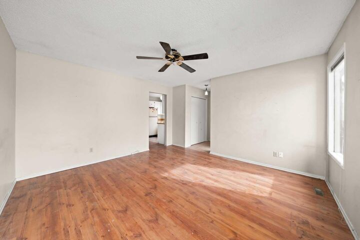 Property Photo:  151 Deerview Court SE  AB T2J 6B6 