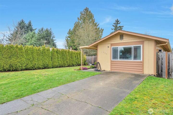 Property Photo:  1309 E 55th Street  WA 98404 