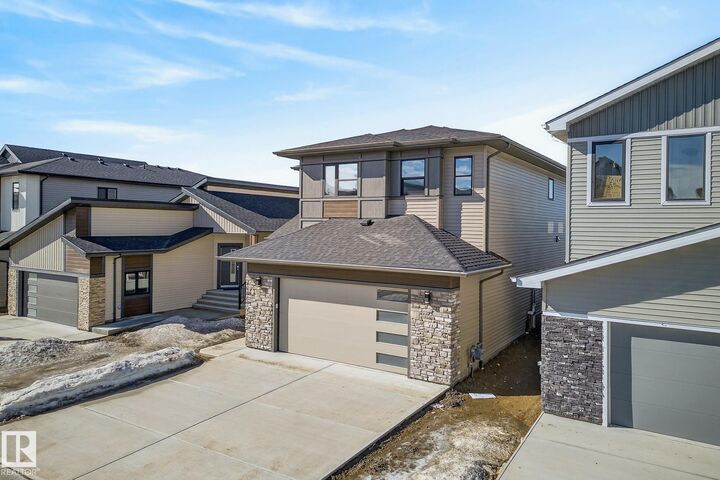 Property Photo: 7091 Kiviaq Crescent SW AB T6W 5N7