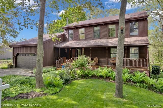 Property Photo: 1155 Teakwood Circle MI 48840