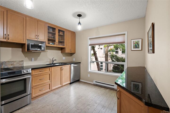 Property Photo: 9919 Fourth St 206 BC V8L 2Z6