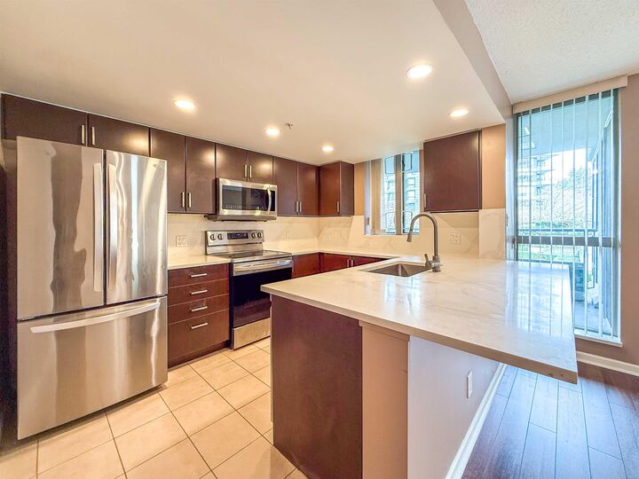 Property Photo: 295 Guildford Way 201 BC V3H 5N3