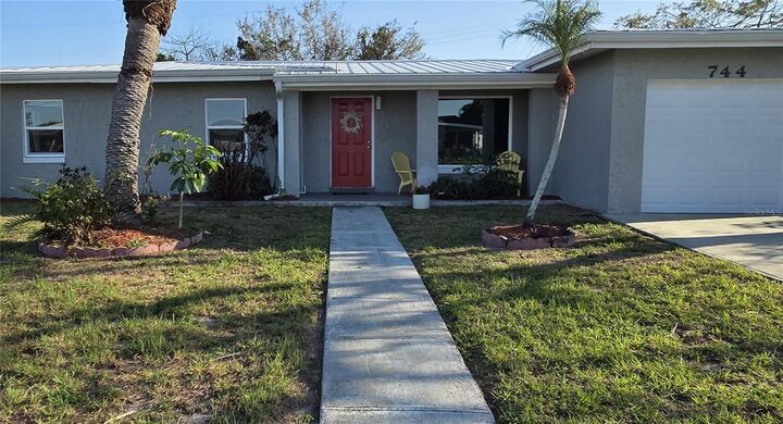 Property Photo:  744 Conreid Drive NE  FL 33952 