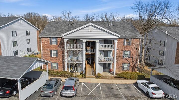 Property Photo: 7611 Triwoods Drive J MO 63119