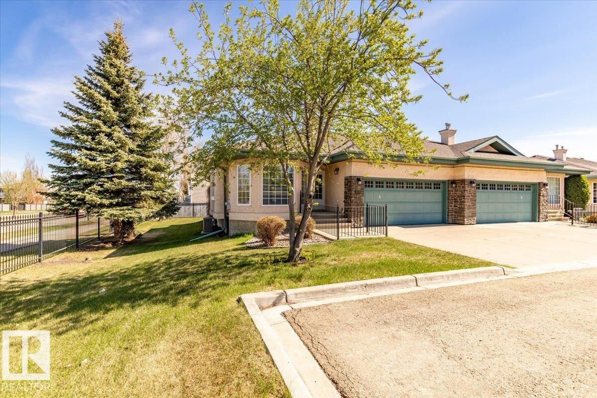 Property Photo: 102 Bridgeport Crossing 4 AB T9E 8K8