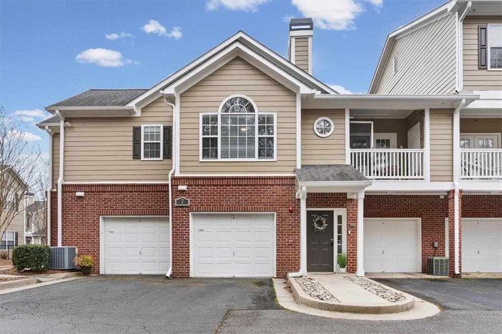 Property Photo:  7104 Woodland Lane  GA 30009 