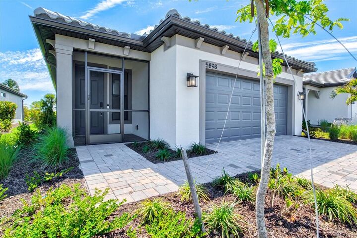 Property Photo:  5898 Talon Preserve Drive  FL 34275 