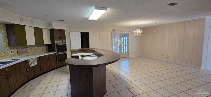 Property Photo:  8246 Chellie Rd  FL 32526 