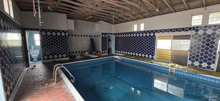 Property Photo:  8246 Chellie Rd  FL 32526 