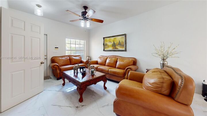 Property Photo:  809 NW 170th Ter 26  FL 33028 